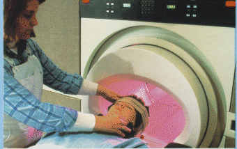 [Patient entering MRI  machine]