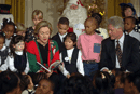 [PHOTO: President and First Lady reading �Twas the Night Before Christmas to students]