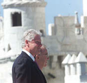 The President smiles at the crowd during the arrival ceremony at Torre de Belem.