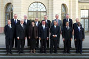The President poses with world leaders for a class photo from the Conference on Progressive Governance.
