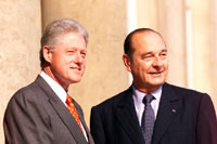 President Clinton and President Chirac smile at the crowd outside Elysee Palace.