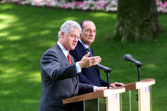 President Clinton answers a question during the press conference in the garden of Elysee Palace.