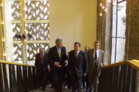 Inside the Gürzenich, President Clinton and Chancellor Schroeder confer as they head to their bilateral meeting.