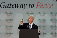 President Clinton gives a speech on the continuing peace process in Northern Ireland at the Odyssey Center in Belfast, Northern Ireland
