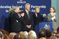 The President is introduced at the Guinness Store House in Dublin, Ireland. He is accompanied by Taoiseach Bertie Ahern, Celia Larkin, First Lady Hillary Rodham Clinton, and Chelsea Clinton. 