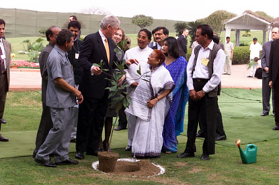 President Clinton and daughter Chelsea participate in a Gandhi tree planting ceremony, Rajghat Samadhi.  New Delhi.