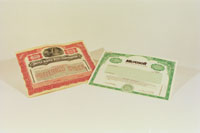 PHOTO: Two stock certificates